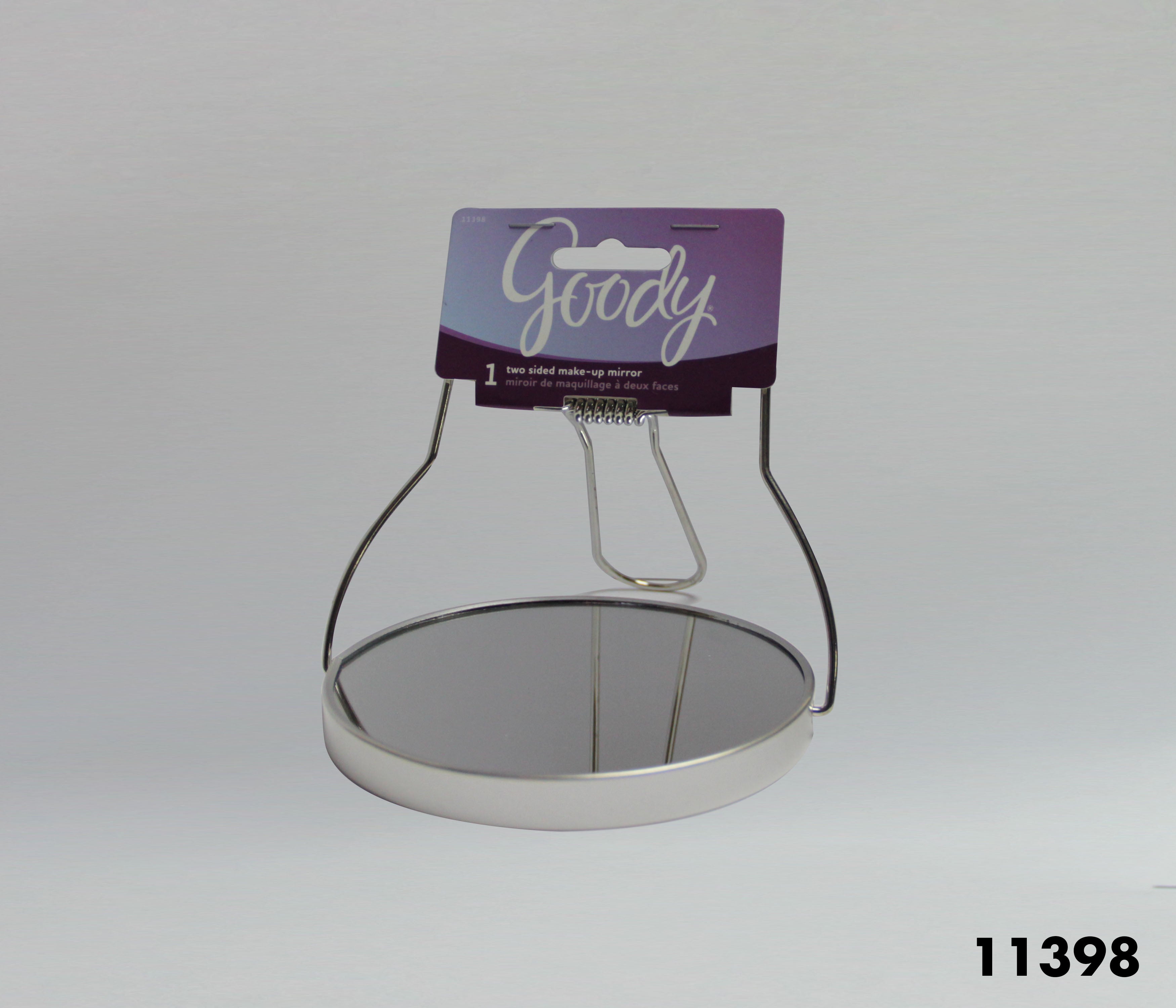 Two-sided makeup mirror